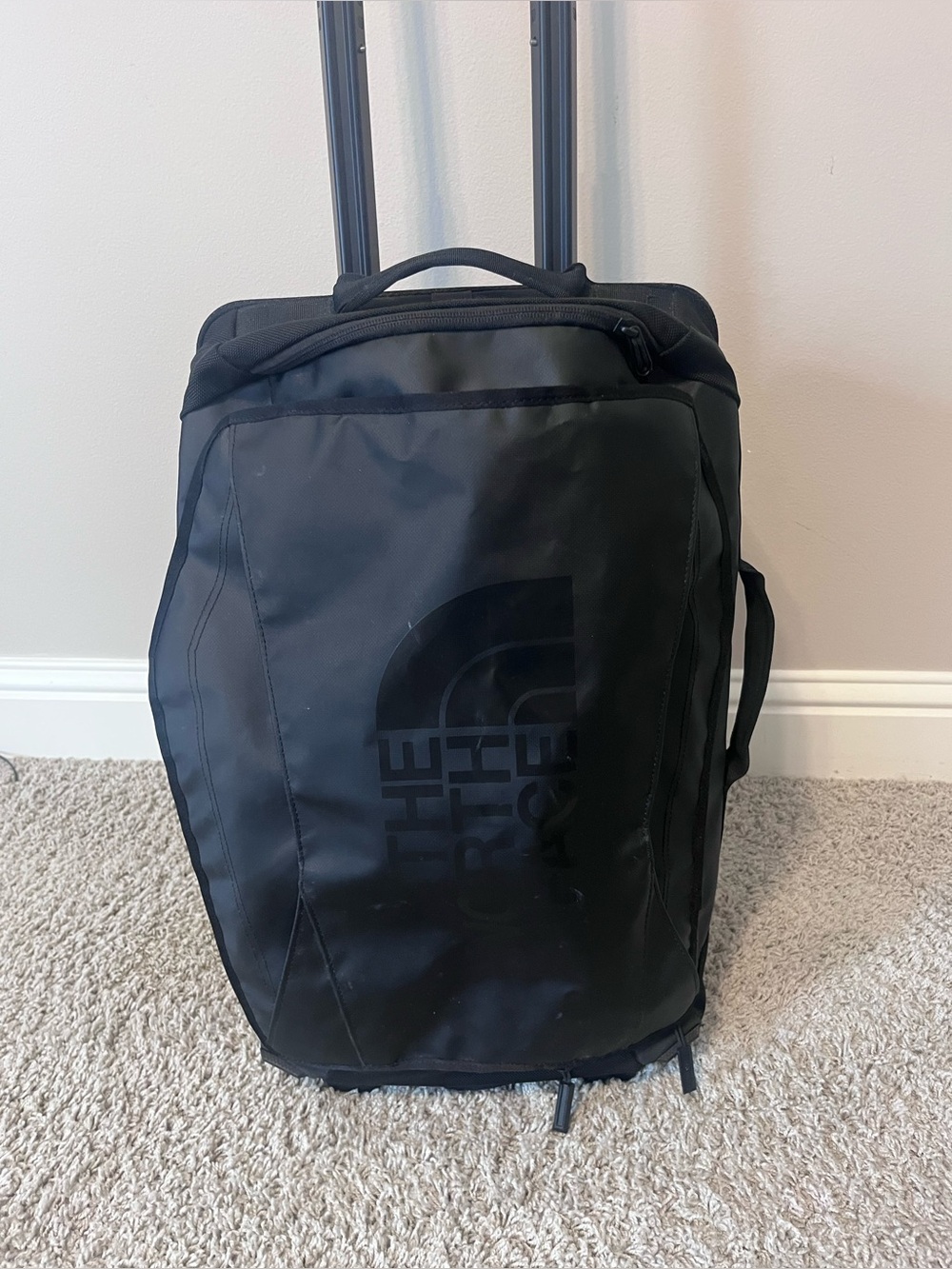 The North Face Black Rolling Duffel Carry On